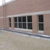 Owner: Kennett Square Consolidated School District <br>Engineer: Wiss Janney and Elstner<br>Scope: Remove brick to access existing flashing, underpin to secure, clean and prep to install new flashing